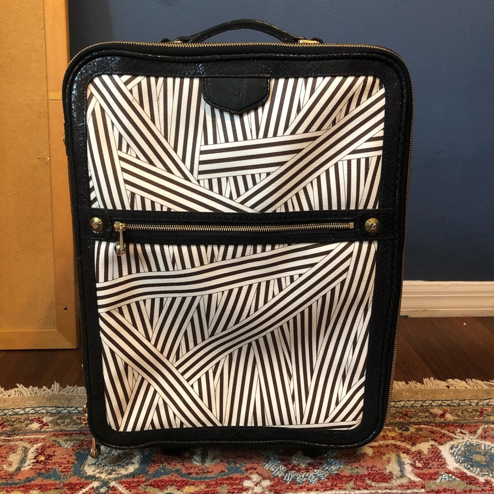Henri Bendel disturbed striped carry on suitcase